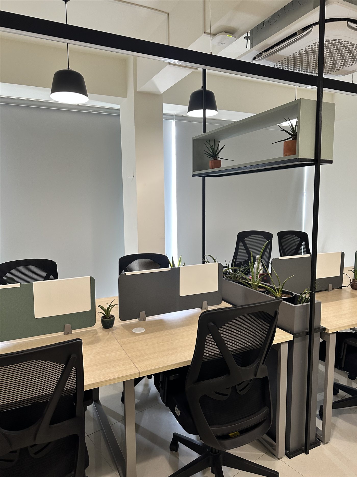 British Blitz workspace with desks, plants, and campaign planning area